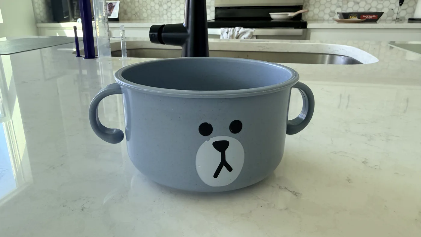 The same blue bear bowl on the counter with the suction base removed